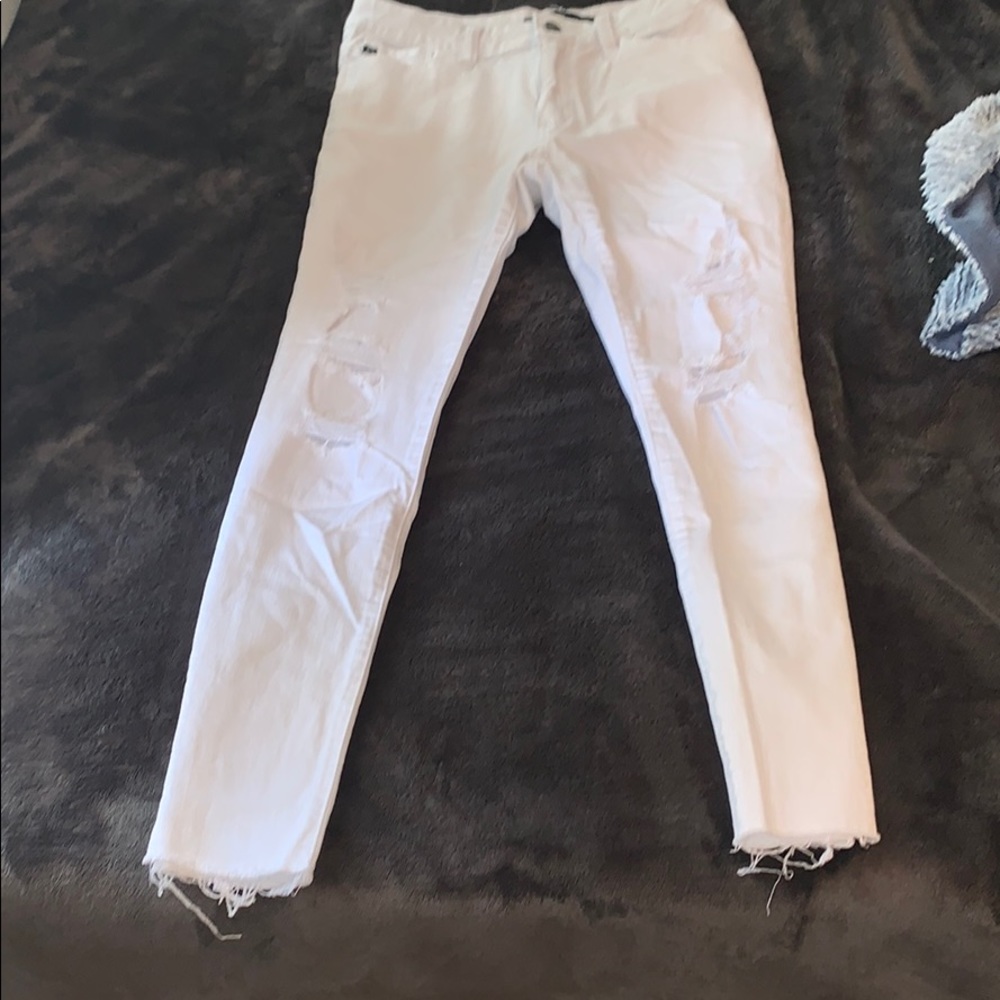White distressed skinny jeans.